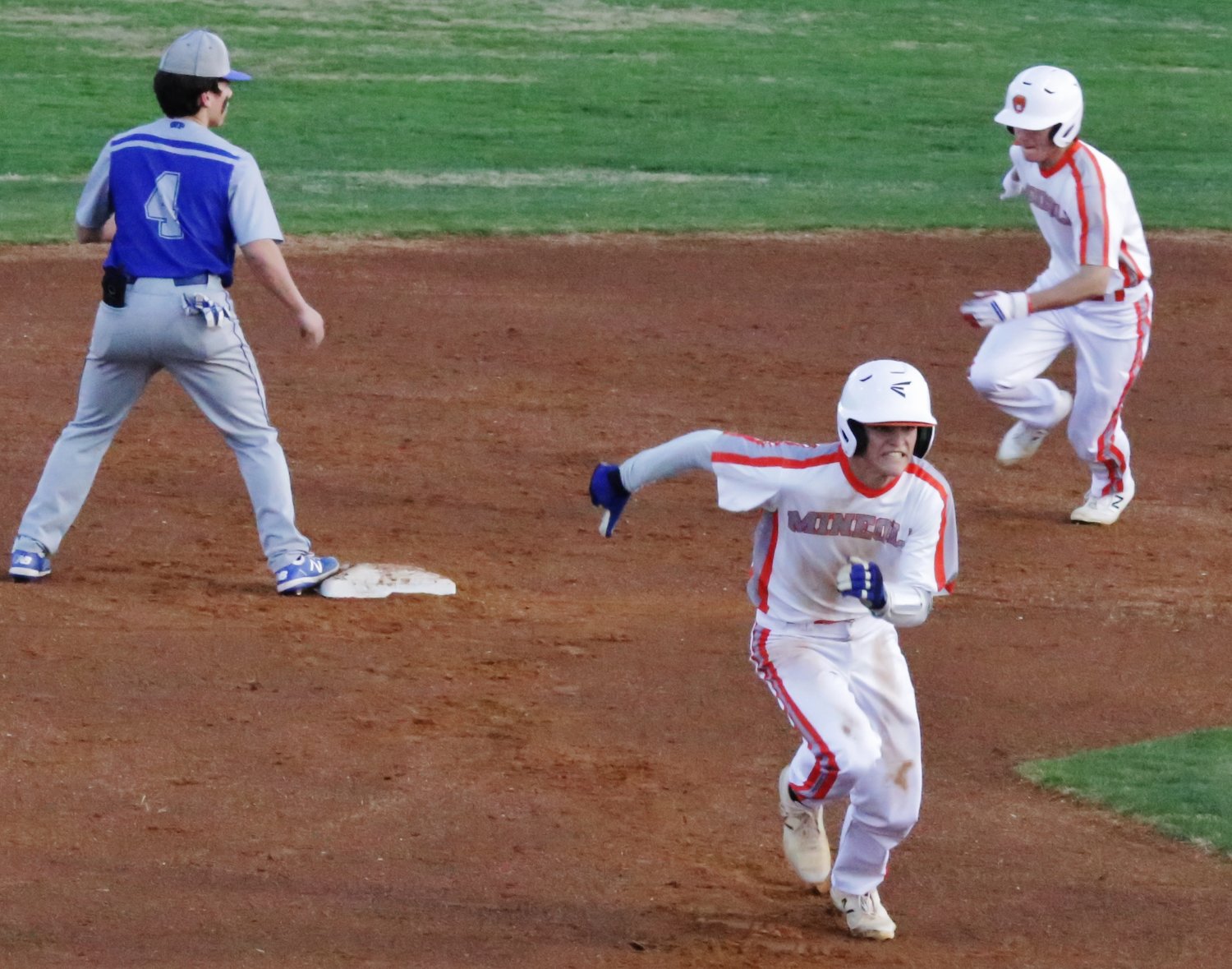 Jacket Coy Anderson leads Cason Davis around the base paths in last week’s win over Wills Point.